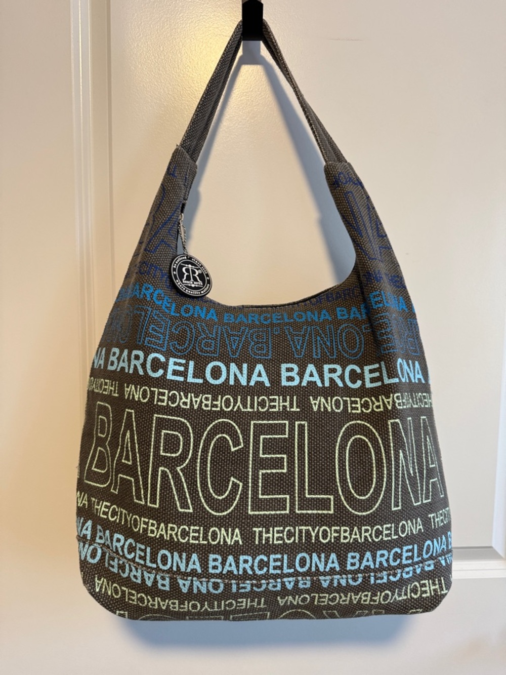 Robin Ruth BARCELONA Black-Lined Woven Hobo/Tote with Blue Accent letters.